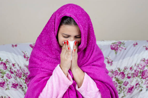 istock Visibly dejected woman with flu symptoms 1319780416