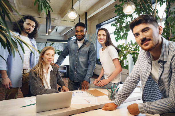 istock Group office portrait of happy diverse colleagues 1319781078