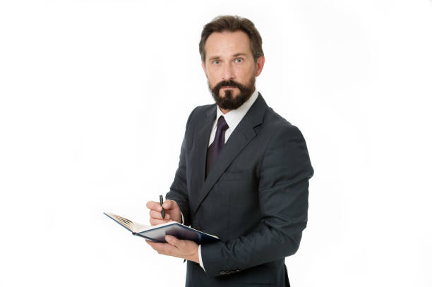 istock Businessman planning schedule hold notepad. Time management and organizing skill. Man bearded manager concentrated face listening you and noticing. Successful businessman planning. Well organized 1319783825