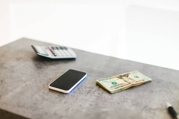 Home Office Personal Finance Technology Tools and Currency Matching 4K Video Available (Shot with Canon 5DS 50.6mp photos professionally retouched - Lightroom / Photoshop - original size 5792 x 8688 downsampled as needed for clarity and select focus used for dramatic effect)