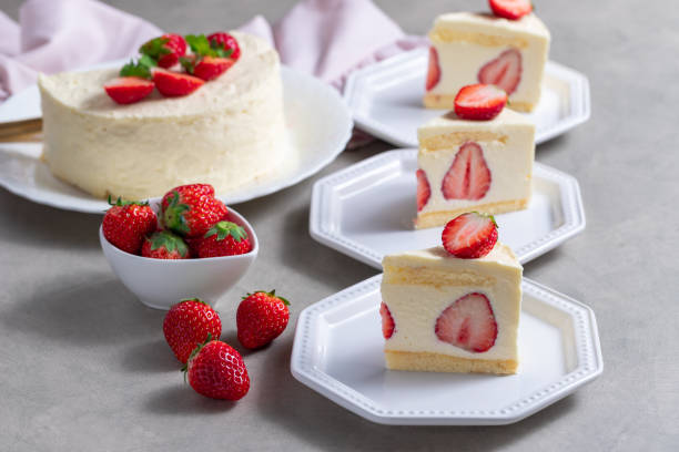 istock Delicious cheesecake with fresh strawberries without baking on a gray background 1319788439