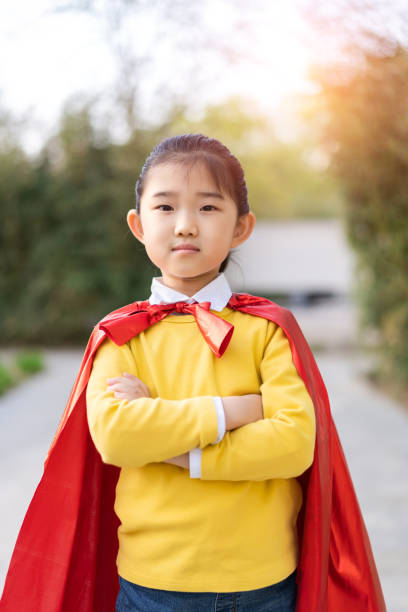 istock Supergirl Arms Crossed 1319789117