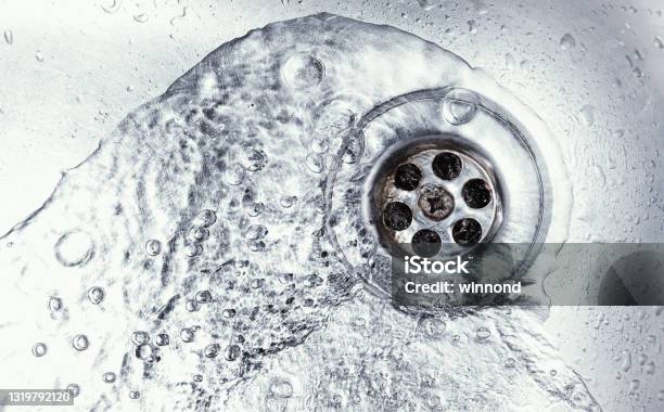 Sink Hole Stock Photo - Download Image Now - Sewer, Drain, Cleaning