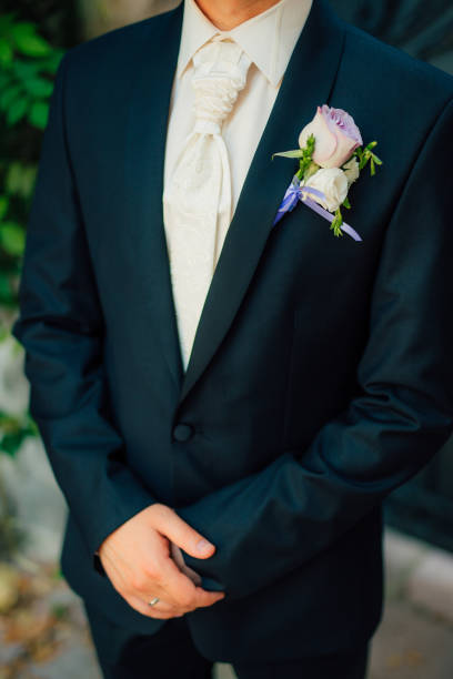 istock Midsection Of Man Holding Flower Bouquet 1319798950