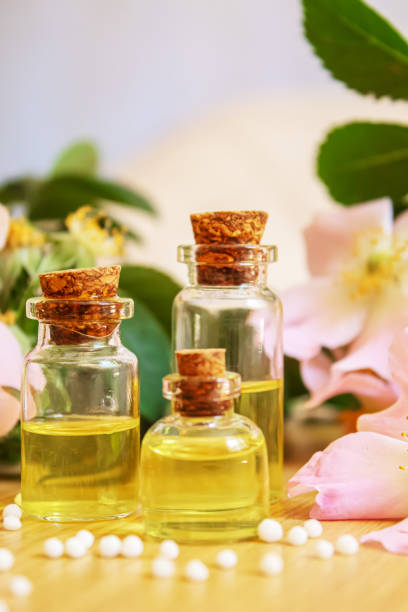 istock rosehip extract in bottles. Homeopathy. Selective focus. 1319799177