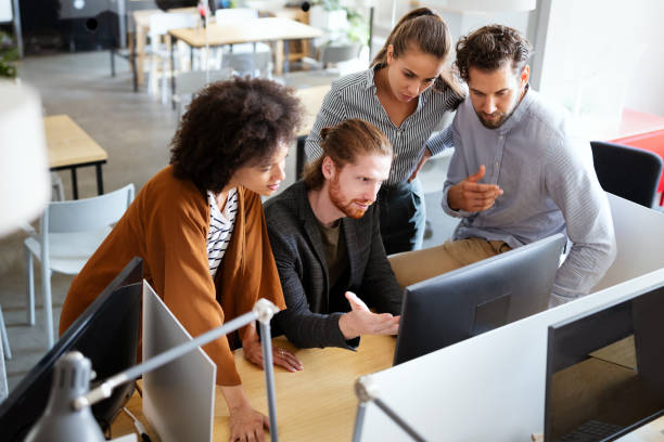 istock Collaboration and analysis by business people working in office 1319800276