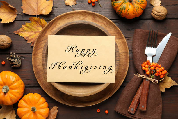 istock Seasonal table setting with Happy Thanksgiving Day 1319803760