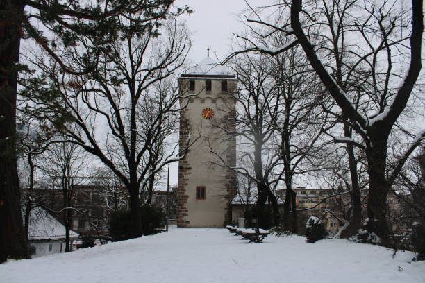 istock Clock tower on a snowy day. 1319806100