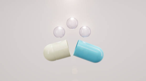 istock Capsule pill opening and vitamin bubbles. 1319806204