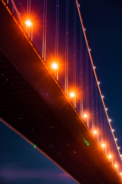 istock Tsing ma bridge at night moment 1319807912