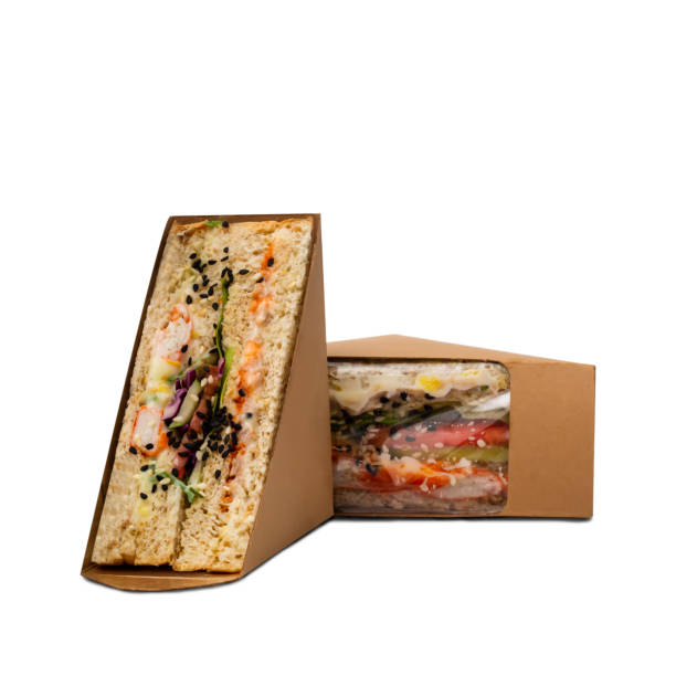 istock Two crab sticks mayonnaise sandwiches in a paper box 1319809042