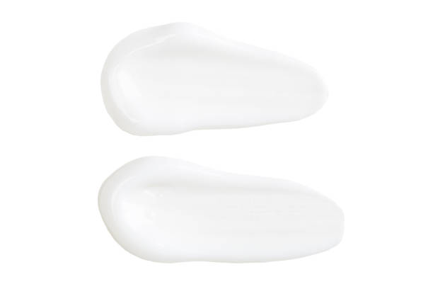 istock White Cosmetic Cream Isolated on White Background. Lipstick Smear. 1319811039