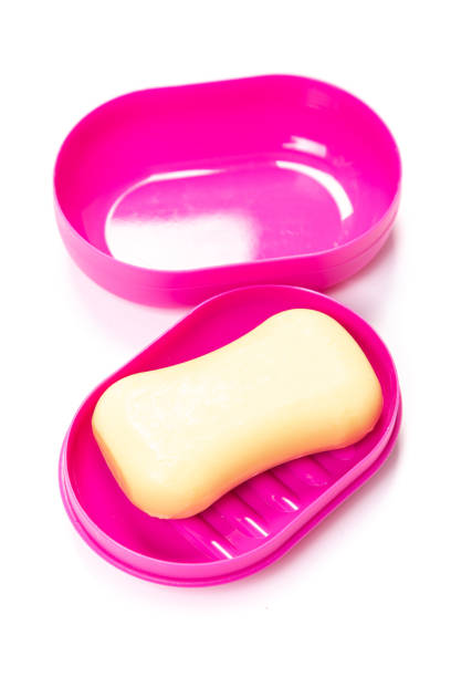 istock Soap in PLASTIC COLORED soap dish isolated on white background 1319811645