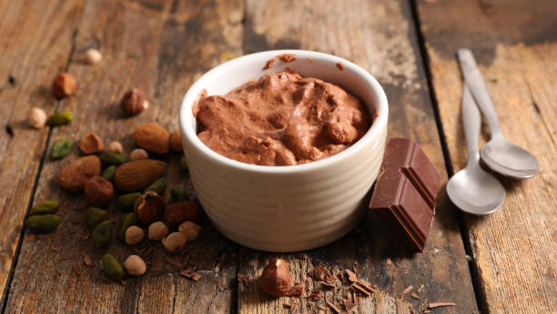 istock chocolate mousse on wood background 1319812035