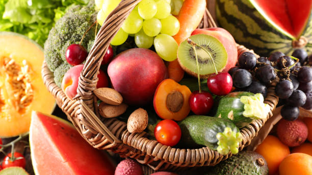 istock fresh assorted of fruits in basket 1319812049