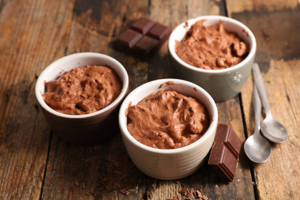 istock chocolate mousse on wood background 1319812204