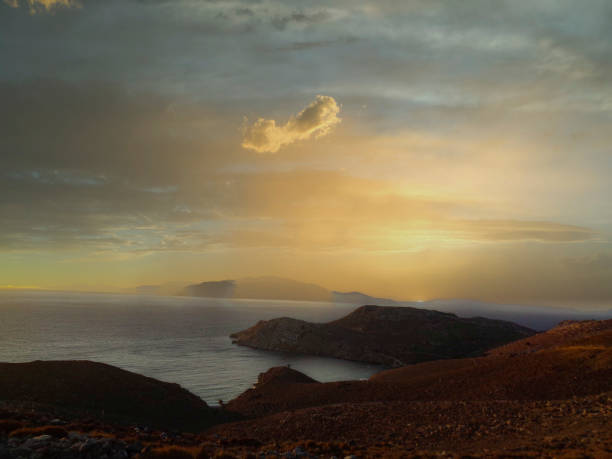 istock wonderful sunset at the beach in greece 1319812555