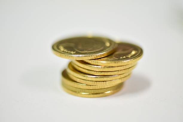 istock Gold coin in business concept. 1319813359