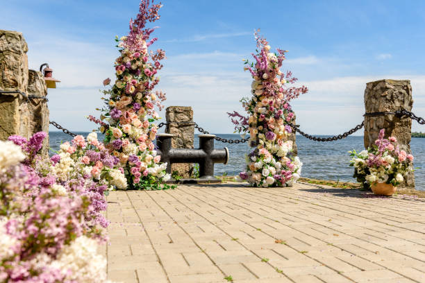 istock Beautiful floral composition for a wedding ceremony on the ocean coast 1319813740