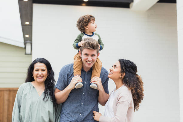 istock Multi-generational family enjoy time together 1319814233