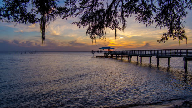 istock Pier on Mobile Bay at sunset 1319816728