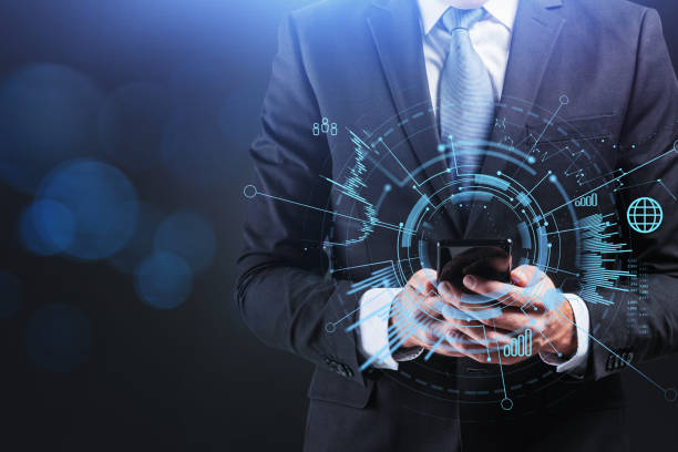 istock Businessman wearing formal suit communicates using smart phone 1319816933