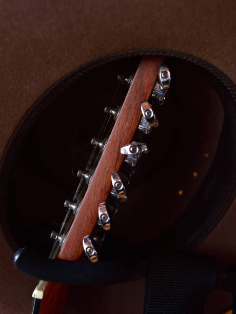 istock A cool hat and a guitar creating a fascinating still life 1319817569