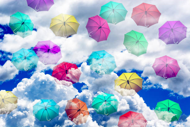 istock 3d.umbrellas have reached the clouds in the sky 1319820989