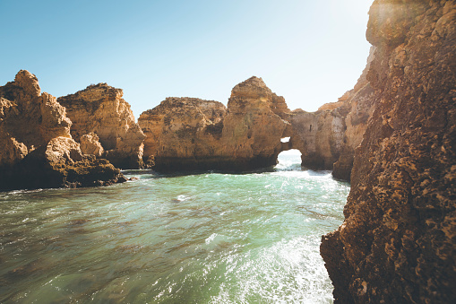 ponta da piedade rocks at algarve coastline in portugal.