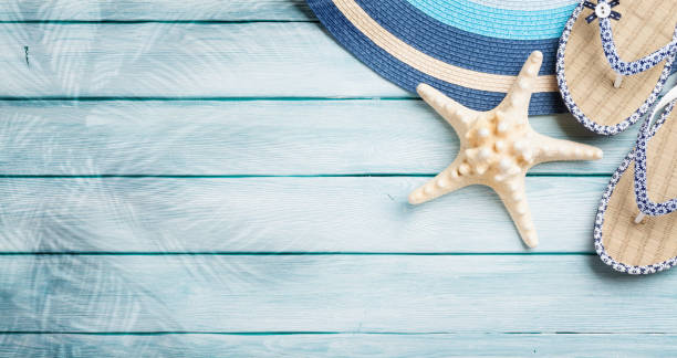 istock Beach accessories on wooden background 1319821134