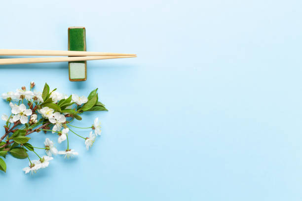 istock Japanese food background with cherry blossom 1319822121