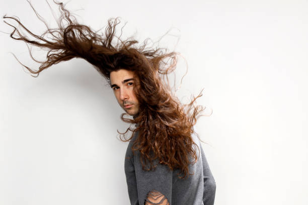 Long Hair Male Stock Photos, Pictures & Royalty-Free Images - iStock