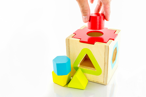 Wooden toy block for baby, children with multicolored  isolated on white background