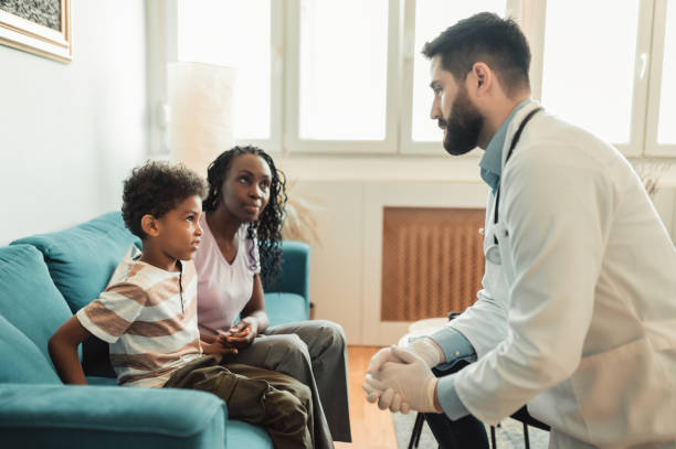 istock Doctor asking the young boy how he feels 1319830939