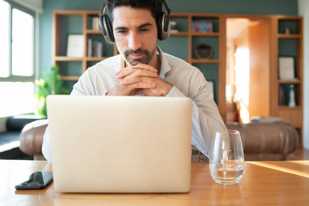 istock Man on a work video call from home. 1319833138