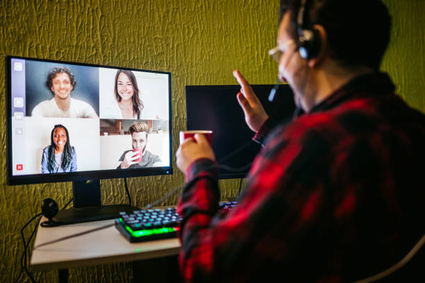 istock Man having a video call with friends 1319836188