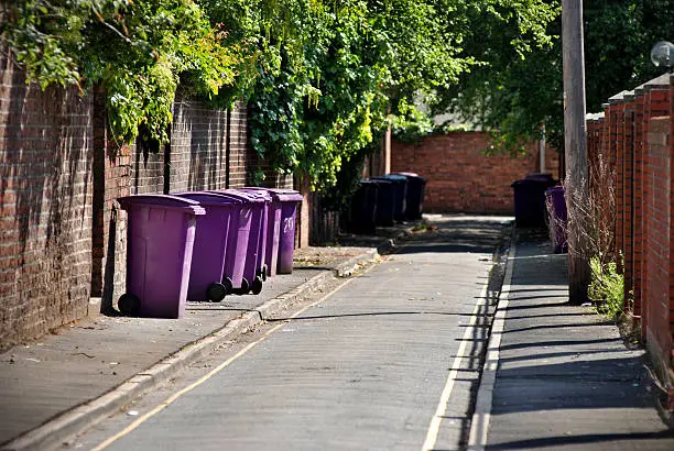 Backstreet with trash bins