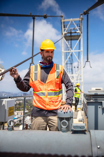 istock Crane Operator Posing at the Top of a Crane - Portrait 1319845821