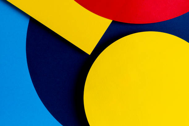 istock Abstract colored paper texture background. Minimal geometric shapes and lines in light blue, navy, red and yellow colors 1319848312