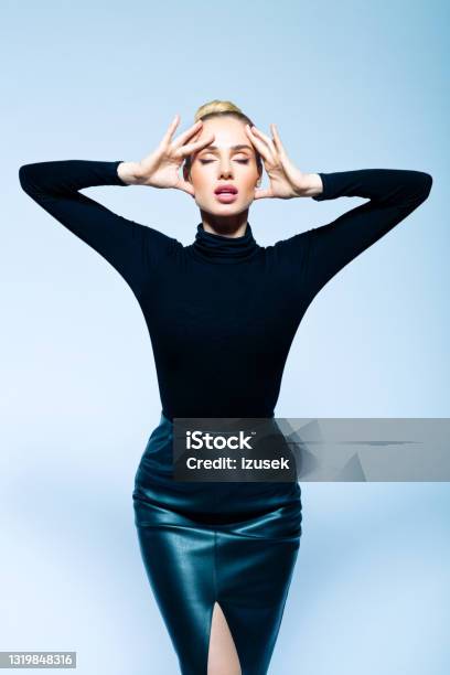 Fashion Portrait Of Confident Elegant Woman Stock Photo - Download Image Now - Fashion Model, Skirt, Leather