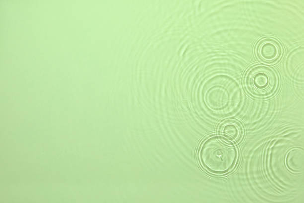 istock green transparent clear water surface texture summer background 1319848819