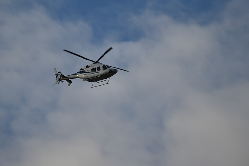Buenos Aires, Argentina - March 15, 2021: Helicopter BELL 429, tail number LV – CTD, in flight. It belongs to grupo Albanesi, Argentina