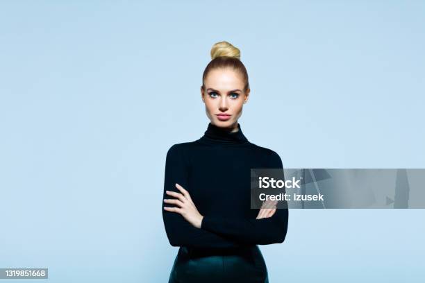 Portrait Of Confident Elegant Woman Stock Photo - Download Image Now - Females, Turtleneck, Blond Hair