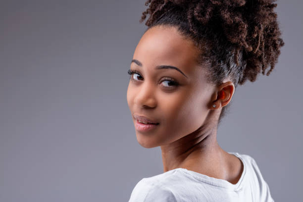 istock Pretty young Black teenager looking back over her shoulder 1319853764