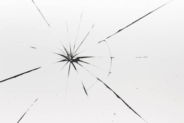 istock Cracks on the glass on a white background. 1319854815