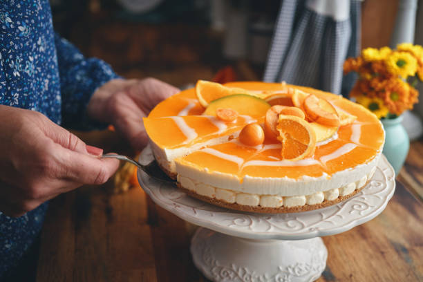 istock Orange Cheesecake with Whipped Cream and White Chocolate 1319855851