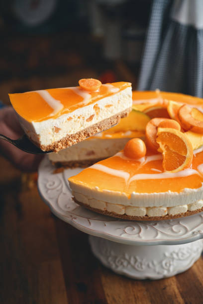 istock Orange Cheesecake with Whipped Cream and White Chocolate 1319855852