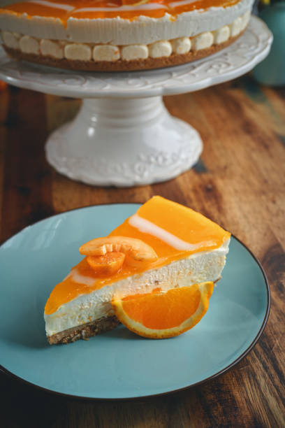 istock Orange Cheesecake with Whipped Cream and White Chocolate 1319855865