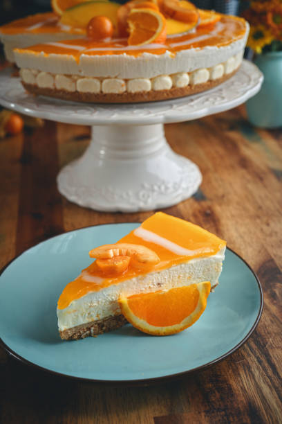 istock Orange Cheesecake with Whipped Cream and White Chocolate 1319855871