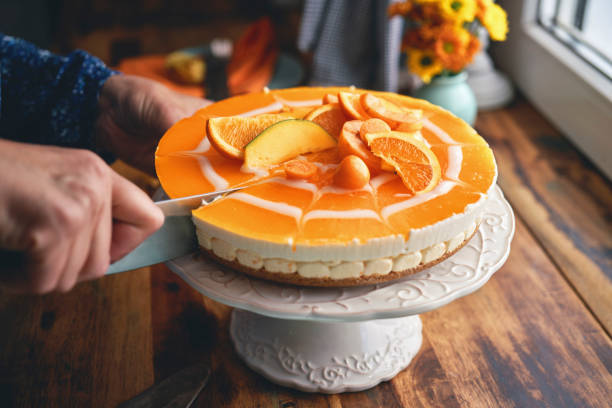 istock Orange Cheesecake with Whipped Cream and White Chocolate 1319855897